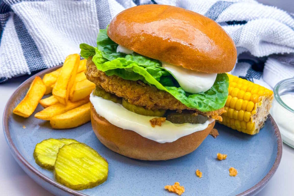 Vegan Crispy Fried Chicken Sandwich with Ranch Sauce with Corn and Fries