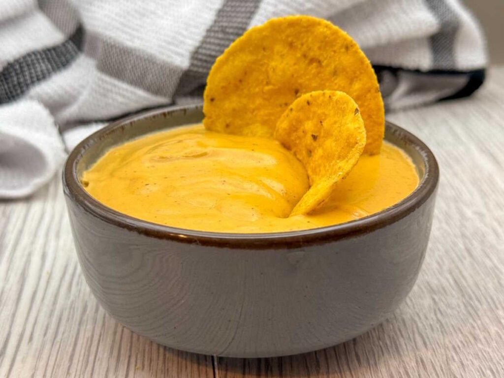 Vegan queso and dipping chips.