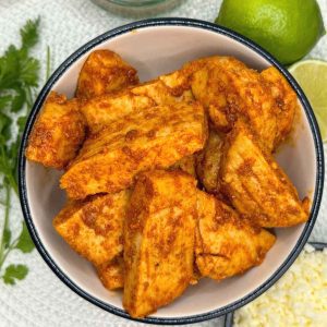 Mexican style chicken marinade smothering sliced plant chicken breast