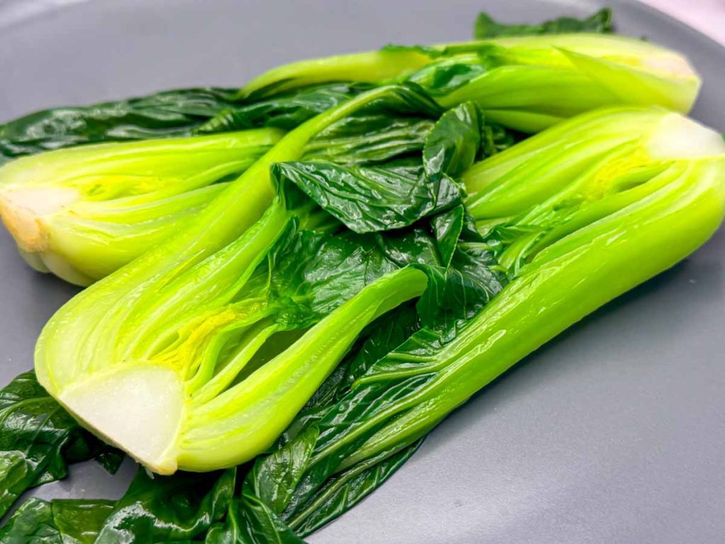 Halved blanched pak choi