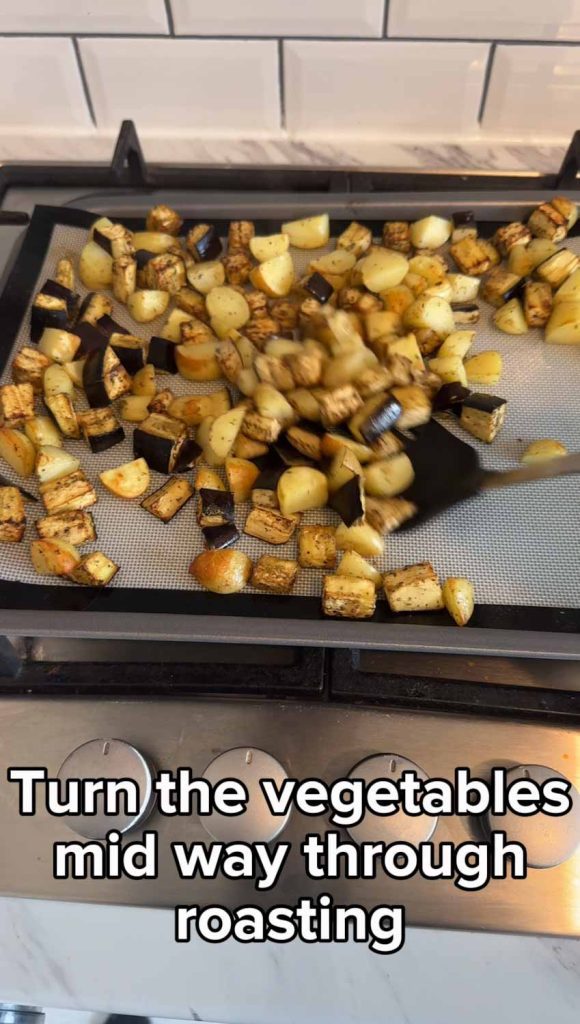 Turn vegetables while baking