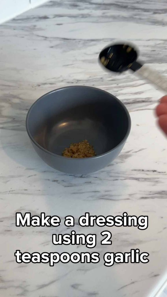 Make a dressing starting with garlic